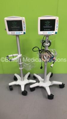 2 x Datex-Ohmeda S/5 FM Patient Monitors on Stands with 1 x GE Multi Parameter Module with NIBP, T1/T2, SPO2 and ECG Options (Both Power Up) *S/N 6282852 / 6282858*