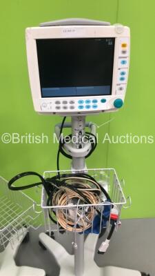2 x Datex-Ohmeda S/5 FM Patient Monitors on Stands with 1 x GE Multi Parameter Module with NIBP, T1/T2, SPO2 and ECG Options (Both Power Up) *S/N 6282852 / 6282858* - 2