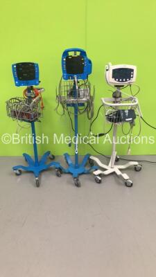 1 x GE Dinamap V100 Carescape Vital Signs Monitor on Stand (Powers Up), 1 x GE Dinamap ProCare Auscultatory 400 Vital Signs Monitor on Stand (No Power) and 1 x Welch Allyn 53N00 Vital SIgns Monitor on Stand (No Power)