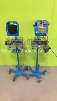 1 x GE Dinamap Pro 300V2 Patient Monitor on Stand with 1 x BP Hose and 1 x SpO2 Finger Sensor and 1 x GE Dinamap ProCare Auscultatory Patient Monitor with 1 x SpO2 Finger Sensor on Stand (Both Power Up,1 x Blank Screen-1 x Broken Facia-See Photos) * SN 03