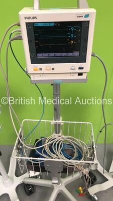 3 x Welch Allyn 53N00 Vital Signs Monitors on Stands and 1 x Philips M3046A M3 Patient Monitor with Philips M300A Multiparameter Module and Leads (All Power Up) *S/N DE00827722 / JA057806 / JA091673 / JA124384* - 4