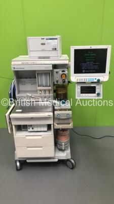 Datex-Ohmeda Aestiva/5 Anaesthesia Machine with Datex-Ohmeda SmartVent Software Version 4.8 PSVPro,Module Rack Including 1 x E-PRESTN Module with SpO2,T1,T2,P1,P2,NIBP and ECG Options,4 x Blank Modules,Datex-Ohmeda Monitor *Crack to Casing*,Printer,Absorb