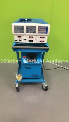 Covidien ForceTriad Energy Platform Electrosurgical/Diathermy Unit Version 4.00 on Valleylab Trolley with Handpiece and Walker Filtration LaserVac Smoke Evacuator (Powers Up) * SN T2A26904EX * * Mfd 2012 *