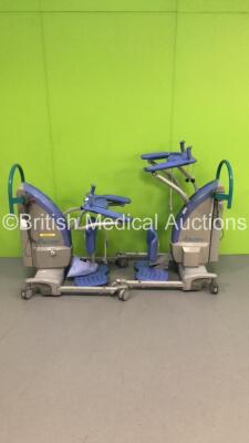 2 x Arjo Encore Electric Patient Hoists with Batteries and Controllers (1 x Powers Up - 1 x Damaged Power Button - See Pictures) *G*