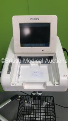 1 x Philips Avalon FM20 Fetal Monitor on Stand (Powers Up - Missing Printer Cover - See Pictures) and 1 x Mindray VS-800 Vital Signs Monitor on Stand (No Power - Missing Top Light Cover - See Pictures) *S/N DE53001837 / BY-83104675* - 2