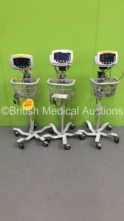 3 x Welch Allyn 53N00 Vital Signs Monitors on Stands with SPO2 Finger Sensors and BP Hoses (All Power Up) S/N 024468 / 034068 / 232756*