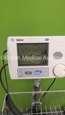 1 x Fisher and Paykel Airvo 2 Humidifier on Stand (Unable to Power Test Due to No Power Supply - Missing Button - See Pictures) and 1 x Agilent A1 Patient Monitor on Stand with SPO2 Finger Sensor and BP Hose (Powers Up) - 2