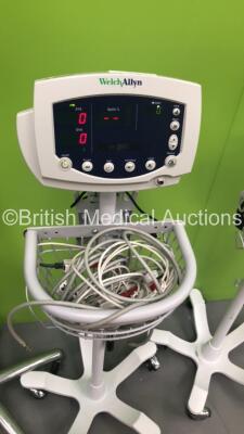 2 x Welch Allyn Spot Vital Signs Monitors on Stands and 2 x Welch Allyn 52N0P Patient Monitors on Stands with 2 x BP Hoses and 2 x SpO2 Finger Sensors (All Power Up) * SN - 4