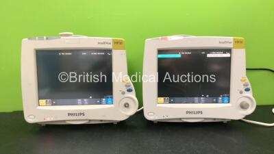 2 x Philips IntelliVue MP30 M8002A Patient Monitors Revision M.04.00, M.04.00 (Both Power Up, 1 with Missing Dial and Cracked Casing, 1 with Cracked Screen-See Photos)