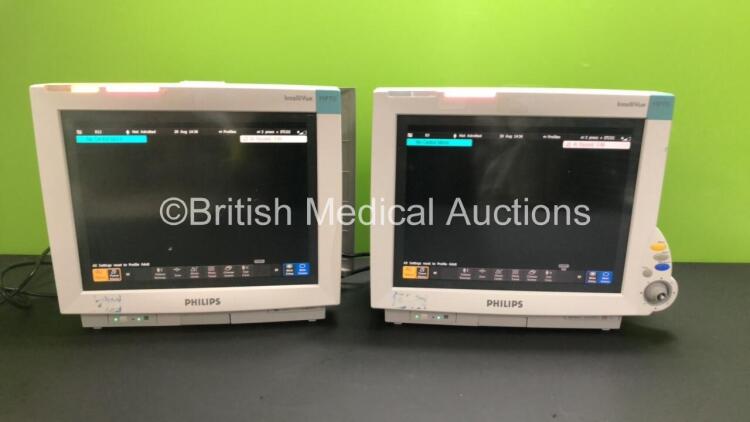 2 x Philips IntelliVue MP70 Touchscreen Patient Monitors *Mfds - 10/2009 and 02/2007, SW-REVs L.01.21* (Both Power Up, 1 x Missing Dial - See Photo)