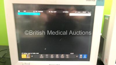 2 x Philips IntelliVue MP70 Touchscreen Patient Monitors *Mfds - 10/2009 and 02/2007, SW-REVs L.01.21* (Both Power Up, 1 x Missing Dial - See Photo) - 6