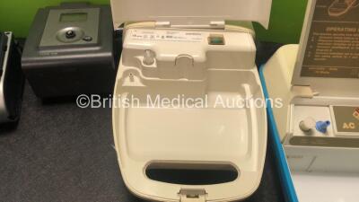 Mixed Lot Including 1 x Cardinal Health IVAC PCAM Pump (No Power) 5 x Medix AC 2000 Nebulisers (All Power Up) 2 x Philips Respironics REMstar Auto CPAP Units with 1 x AC Power Supply (Both Power Up, 1 with Missing Dial-See Photo) 1 x ResMed Escape S9 CPAP - 9