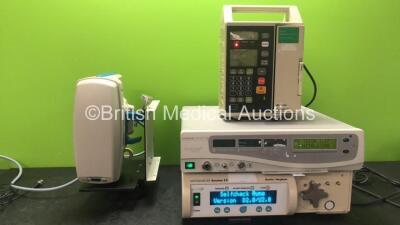 Mixed Lot Including 1 x Gaymar Gaymar Ref FW603 Blood / Liquid Warmer, 1 x Baxter Flo Gard 6201 Volumetric Infusion Pump, 1 x Gynecare Term Choice II Uterine Balloon Therapy Unit and 1 x Smith + Nephew Dyonics Access 15 Fluid Management System (All Power 