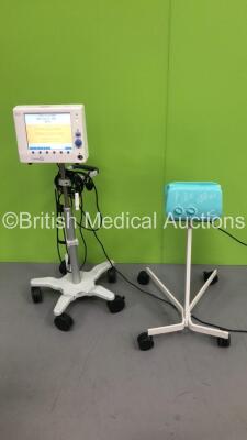 Mixed Lot Including 1 x Deltex Medical Cardio Q ODM Patient Monitor on Stand with Leads and 1 x Ameda Elite Breast Pump on Stand (Both Power Up)