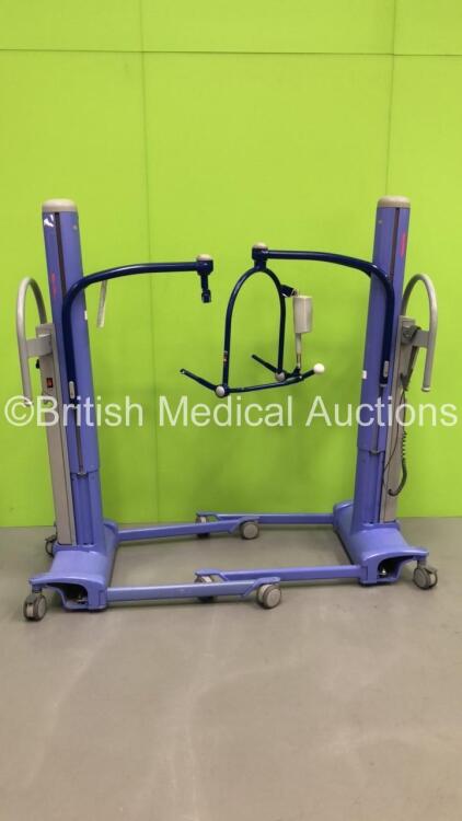 2 x Arjo Maxi Move Electric Patient Hoists with Batteries and Controllers (Both Power Up - 1 x Incomplete - See Pictures)