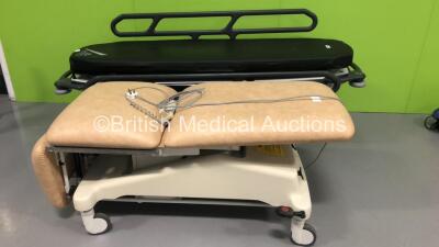 1 x Anetic Aid QA3 Hydraulic Patient Examination Couch with Mattress (Hydraulics Tested Working) and 1 x Huntleigh 3 Way Hydraulic Patient Examination Couch with Controller (Powers Up)