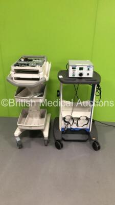 1 x EZEM ProtoCO2 L Colon Insufflator on Stand (Powers Up) and 1 x Philips 860310 ECG Machine on Stand (Spares and Repairs - Missing Upper Screen Panel)