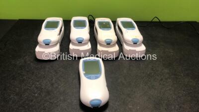 5 x Roche Coaguchek XS Pro Blood Coagulation Monitors with 4 x Docking Stations and 1 x AC Power Supply (All Power Up) *GL*