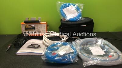 Drager Oxylog 3000 Portable Ventilator Software Version 01.24 with 1 x Hose, 1 x AC Power Supply, 1 x DC Power Supply and 3 x Pediatric Breathing Circuits and 1 x Vent Star Breathing Circuit in Carry Bag *Mfd 2008 (Powers Up) *SN SRZD-0099*