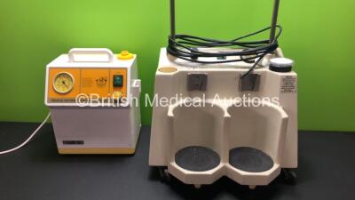 1 x Sam 12 Portable Suction Unit (Powers Up) and 1 x Eschmann VP35 Twin Suction Unit on Wheels (Cut Power Supply)