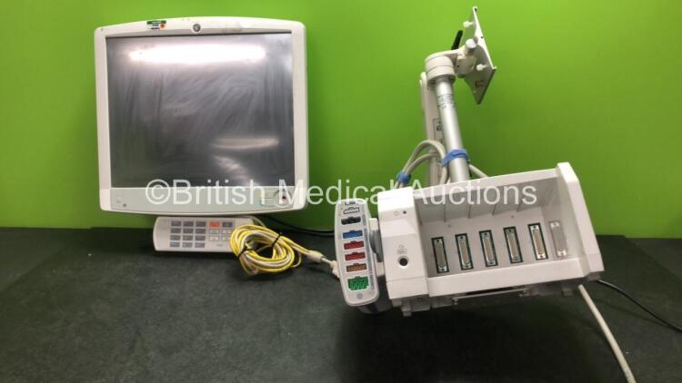 Job Lot Including 1 x GE D19KT Monitor (Powers Up with Missing Dial-See Photo) 1 x GE Ref F5-01 Module Rack, 1 x GCX Monitor Arm and 1 x GE Dinamap Module Including ECG, NIBP, Temp/CP, P1/P3, P2/P4 and SpO2 Options