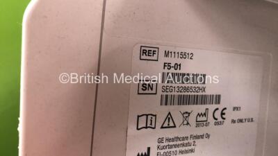 Job Lot Including 1 x GE D19KT Monitor (Powers Up with Missing Dial-See Photo) 1 x GE Ref F5-01 Module Rack, 1 x GCX Monitor Arm and 1 x GE Dinamap Module Including ECG, NIBP, Temp/CP, P1/P3, P2/P4 and SpO2 Options - 7