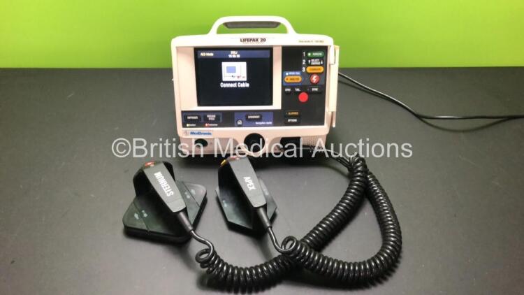 Medtronic Lifepak 20 Defibrillator / Monitor Including Hard Paddles (1 x Missing Base) ECG and Printer Options (Powers Up with Service Light and Facia in French)