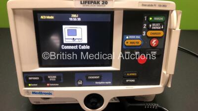 Medtronic Lifepak 20 Defibrillator / Monitor Including Hard Paddles (1 x Missing Base) ECG and Printer Options (Powers Up with Service Light and Facia in French) - 2