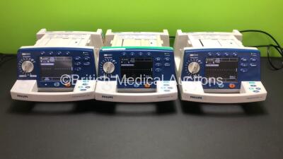 3 x Philips HeartStart XL Smart Biphasic Defibrillators with Pacer, ECG and Printer Options (All Powers Up When Plugged In)