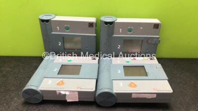 2 x Forerunner and 2 x Hewlett Packard Heartstream Semi-Automatic Defibrillators with 1 x Battery (Untested Due to Flat Battery)