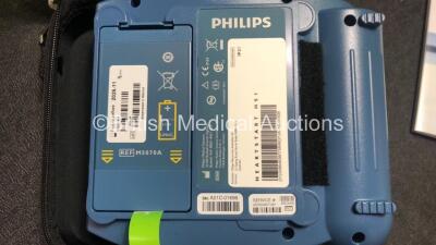 3 x Philips Heartstart HS1 Defibrillators with 3 x Philips Ref M5070A Batteries *Install Dates - 11-2026, 11-2026, 11-2026* with 3 x Philips M5071A Smart Pads Cartridge *Use By Dates- 07-2023. 07-2023, 07-2023* (All Power Up and Boxed in Excellent Conditi - 3