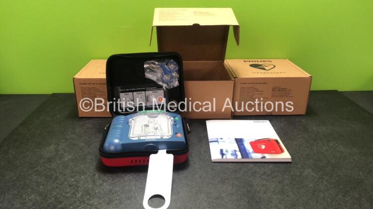 3 x Philips Heartstart HS1 Defibrillators with 3 x Philips Ref M5070A Batteries *Install Dates - 11-2026, 11-2026, 11-2026* with 3 x Philips M5071A Smart Pads Cartridge *Use By Dates- 07-2023. 07-2023, 07-2023* (All Power Up and Boxed in Excellent Conditi