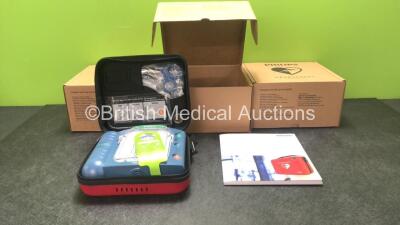 3 x Philips Heartstart HS1 Defibrillators with 3 x Philips Ref M5070A Batteries *Install Dates - 11-2026, 11-2026, 11-2026* with 3 x Philips M5071A Smart Pads Cartridge *Use By Dates- 07-2023. 07-2023, 07-2023* (All Power Up and Boxed in Excellent Conditi