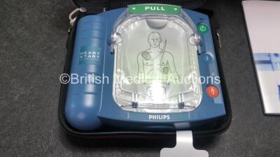 3 x Philips Heartstart HS1 Defibrillators with 3 x Philips Ref M5070A Batteries *Install Dates - 11-2026, 11-2026, 11-2026* with 3 x Philips M5071A Smart Pads Cartridge *Use By Dates- 07-2023. 07-2023, 07-2023* (All Power Up and Boxed in Excellent Conditi - 2