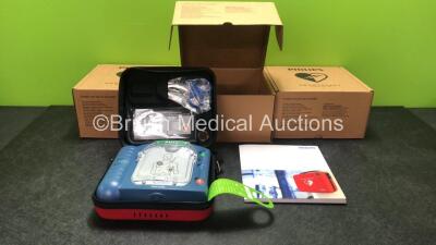 3 x Philips Heartstart HS1 Defibrillators with 3 x Philips Ref M5070A Batteries *Install Dates - 11-2026, 11-2026, 11-2026* with 3 x Philips M5071A Smart Pads Cartridge *Use By Dates- 07-2023. 07-2023, 07-2023* (All Power Up and Boxed in Excellent Conditi