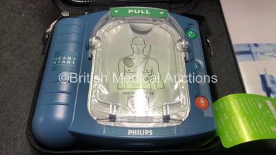 3 x Philips Heartstart HS1 Defibrillators with 3 x Philips Ref M5070A Batteries *Install Dates - 11-2026, 11-2026, 11-2026* with 3 x Philips M5071A Smart Pads Cartridge *Use By Dates- 07-2023. 07-2023, 07-2023* (All Power Up and Boxed in Excellent Conditi - 2