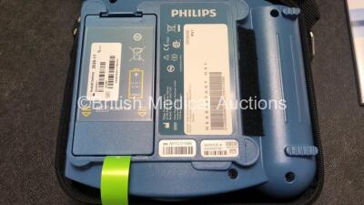 3 x Philips Heartstart HS1 Defibrillators with 3 x Philips Ref M5070A Batteries *Install Dates - 11-2026, 11-2026, 11-2026* with 3 x Philips M5071A Smart Pads Cartridge *Use By Dates- 07-2023. 07-2023, 07-2023* (All Power Up and Boxed in Excellent Conditi - 3