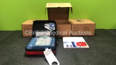 3 x Philips Heartstart HS1 Defibrillators with 3 x Philips Ref M5070A Batteries *Install Dates - 11-2026, 11-2026, 11-2026* with 3 x Philips M5071A Smart Pads Cartridge *Use By Dates- 07-2023. 07-2023, 07-2023* (All Power Up and Boxed in Excellent Conditi