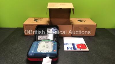 3 x Philips Heartstart HS1 Defibrillators with 3 x Philips Ref M5070A Batteries *Install Dates - 11-2026, 11-2026, 11-2026* with 3 x Philips M5071A Smart Pads Cartridge *Use By Dates- 07-2023. 07-2023, 07-2023* (All Power Up and Boxed in Excellent Conditi