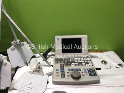 Ophthalmic Job Lot Including 2 x Wall Mounted Arms, 5 x Slit Lamp Chin Rests, 1 x Nidek Controller, 1 x Eye Piece Attachment , 2 x Light Arms and Approximately 12 x Chin Rest Rail Protectors *16094, 04040004* - 4