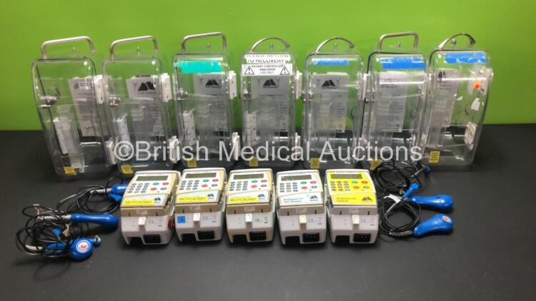 5 x CME McKinley Bodyguard Infusion Pumps with 5 x Bases, 5 x Finger Controls and 7 x Boxes (All Power Up)