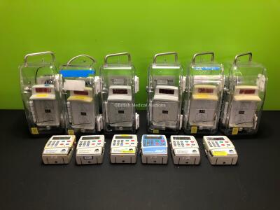 6 x CME McKinley Bodyguard 575 Infusion Pumps with 6 x Bases, 5 x Finger Controls and 6 x Boxes (All Power Up)