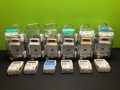 6 x CME McKinley Bodyguard 575 Infusion Pumps with 6 x Bases, 5 x Finger Controls and 6 x Boxes (All Power Up)