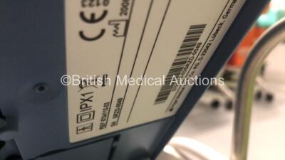 Drager Carina Ventilator on Stand Software Version 03.21 Boot Software Version D1.7 - Operating Hours 3637 with Battery and Battery Cable (Powers Up) *S/N SRZD-0049* **Mfd 2008** - 12