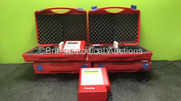 4 x Hemocue B-Hemoglobin Analyzers in Cases with 4 x AC Power Supplies