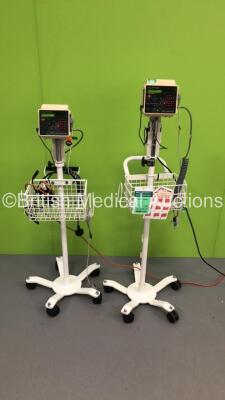 2 x CSI Criticare 506DXN VItal Signs Monitors on Stands with SPO2 Finger Sensors and BP Hoses (Both Power Up)