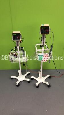 2 x CSI Criticare 506DXN VItal Signs Monitors on Stands with SPO2 Finger Sensors and BP Hoses (Both Power Up) - 2