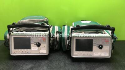 2 x Zoll E Series Defibrillators Including ECG, SpO2, CO2, NIBP and Printer Options with 1 x Battery, 2 x Paddle Leads and 2 x 3 Lead ECG Leads (Both Power Up) *SN AB12B019117, AB12B019116*