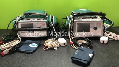 2 x Zoll E Series Defibrillators Including ECG, SpO2, CO2, NIBP and Printer Options with 2 x Batteries, 2 x Paddle Leads and 2 x 3 Lead ECG Leads (Both Power Up) *SN AB12B019113, AB11HO17526