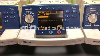 3 x Philips HeartStart XL Smart Biphasic Defibrillators with ECG and Printer Options (All Power Up When Plugged In) - 3